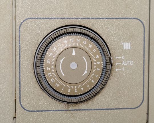 A mechanical boiler timer.