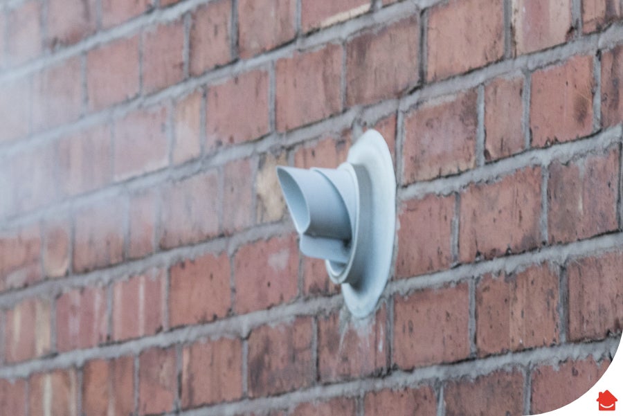 Steam coming out of a boiler flue that correctly follows the boiler flue regulations.