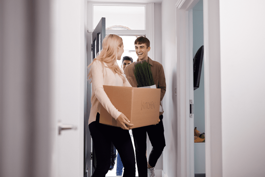 Students moving into university accommodation