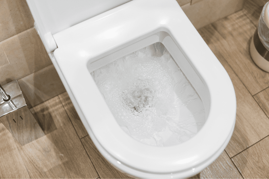 A toilet that keeps running water from the cistern after being flushed.