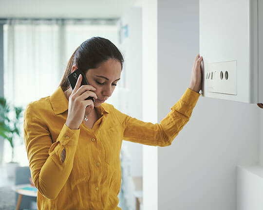 Calling an engineer as to respond to a common boiler problem
