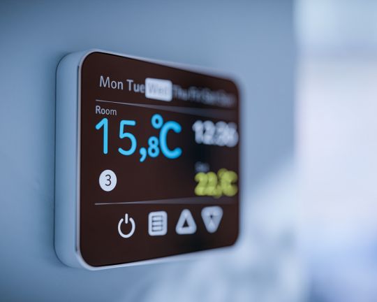A smart thermostat with a boiler timer