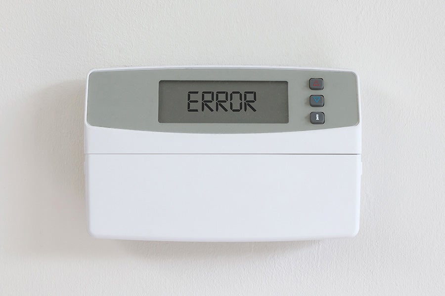 A thermostat not working and displaying an error message.